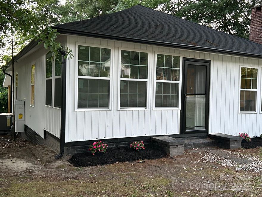 NEW PRICING just in time for summer fun and the upcoming Holidays! Adorable ranch style home in the quaint town of Kershaw with COUNTY TAXES ONLY! Totally remodeled from top to bottom.  A 1934 ERA , has been brought back to it's finest luster, Home includes New roof, gutters, windows ,new gas pack (5 yr. factory part warranty) and duct work, New Navien on command gas hot water heater, new 11x13 deck under the 1 car carport. Interior includes newly remodeled bathroom, tile backsplash, new kitchen cabinets, tile backsplash, new appliances, new fixtures throughout, luxury vinyl flooring, freshly painted, added piers underneath and vapor barrier, on .35 acres. Enclosed porch with new epoxy flooring. Close to Camden, Heath Springs, & Lancaster.  Motivated Seller!!