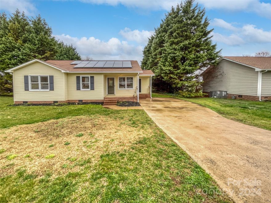 Welcome to this charming home with a natural color palette that creates a warm and inviting atmosphere. This property boasts other rooms for flexible living space, perfect for a home office or hobby room. The primary bathroom features good under sink storage, providing ample space for all your essentials. Step outside to relax in the sitting area in the backyard, surrounded by lush greenery. Fresh interior paint brightens up the home, while partial flooring replacement in some areas adds modern flair. Don't miss the opportunity to make this lovely home your own!