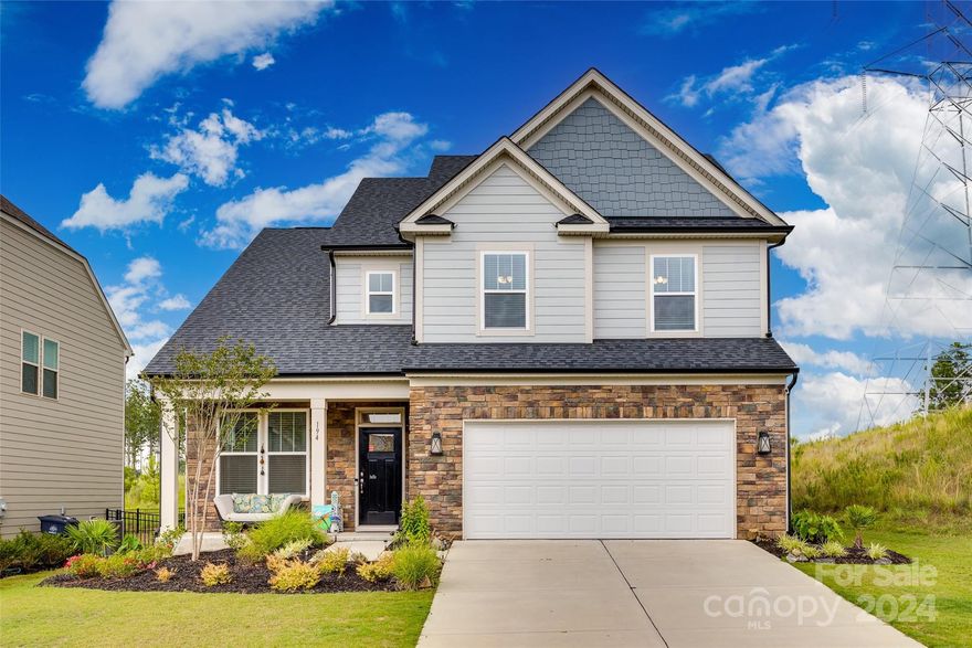 Come check out this beautiful home in desirable Paddlers Cove neighborhood!  Built in 2022, this amazing home will have: 4bdrms up, 2.5 baths, kitchen island, upgraded flooring on 1st floor and wood stairs, open railing, upgraded kitchen cabinets, gas range, upgraded molding, Primary bedroom up, deluxe owner's bath with soaking tub, large morning room with vaulted ceiling and private study! Seller has added a fence and fire pit, enjoy those Carolina evenings sitting in front of a fire on your newly stamped concrete patio. Paddlers Cove offers an abundance of amenities, both natural and traditional: 2 Pools, open air pavilion, walking trails, kayak launch, Field Day Park Sports Complex is right in the community, come play Pickleball! Clover Aquatic Center, and Crowders Creek elementary school is less than 2 miles away! Award winning Clover Schools, make this your home today!