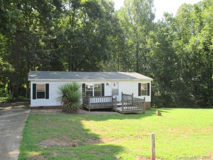 Manufactured double-wide home on 0.57 acre cul-de-sac lot features 3 bedrooms, 2 baths, kitchen and living room. Features include neutral colors, garden tub, and deck. Wooded view at the back. This is an incredible deal!