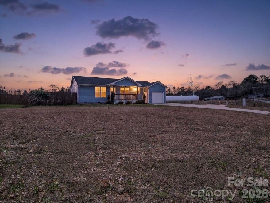 Charming, move-in ready 3 bed, 2 bath home with an open floor plan and beautiful hardwood floors throughout. Thoughtfully updatedwith fresh paint, granite countertops and stainless steel appliances in a bright, modern kitchen. Oversized laundry room offers directaccess to the garage and fenced backyard — perfect for mudroom convenience. Enjoy outdoor storage and workspace in the largeoutbuilding and a fully fenced yard for entertaining or play. **Cash or Conventional only! Back on the market, no fault to the seller.**