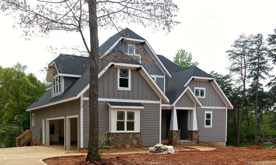 SELLER NOT ACCEPTING OFFERS UNTIL 5pm, APRIL 25th, 2015. Water view lot with lake access & amenities area. Lot large enough for pool envelope. Completion date proposed by May 31st. This unique home features new pocket sliding doors which open to a beautiful lake view off the great room, master on main, walk-out basement with bar/entertainment area & custom granite, cabinets, & tile.