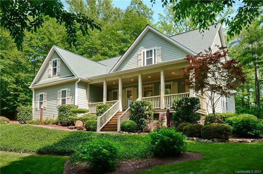 Quality built home nestled in the trees on 1.38 private acres with mountain views, only 9.5 miles (15 min) to downtown Asheville.  The beautiful light filled home features a spacious kitchen with breakfast bar, vaulted ceiling in living room with two skylights & gas FP, dining room, large covered front porch, rear deck & flagstone patio.  Stamped concrete front walkway.  Professionally landscaped yard & flat driveway lead to a 2 car garage. No Asheville City Taxes!  See V-tour for 46 photos.