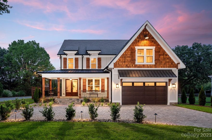 Nestled between the thriving enclaves of Oakhurst and Cotswold sits this exceptional example of a modern farmhouse done right. Brimming with authentic features like reclaimed wide plank heart pine floors, an oversized butcher block topped island, heavy moldings, and shiplap accents. The quality and attention to detail put into this home are evident the moment you pull into the full paver driveway. Live, work and entertain seamlessly courtesy of the flowing main level open floorplan and intelligent second floor bedroom layout. With its fresh green-hued accent cabinetry, the showstopper of a gourmet kitchen will have your friends and family eager to gather around!  Conveniently located just .4 miles from Night Swim Coffee, Noda Yoga, The Teal Turnip, Swirl Bakery, and more. Common Market and The Vaulted Oak brewery are just a little further up the road. An easy 10-minute commute to Uptown Charlotte. Many new custom homes are being constructed in this red-hot area. Don't miss out!