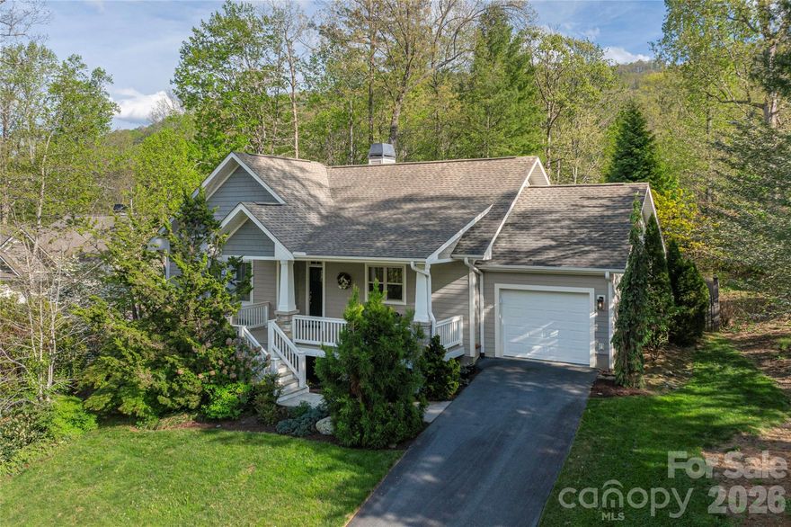 OPEN HOUSE SUNDAY, APRIL 26th 2-4!
Experience single-level living at its finest in this striking, meticulously maintained 2BR/2BA retreat on a private wooded lot in Biltmore Lake’s award-winning community. This open-concept home features vaulted ceilings, hardwood floors, and abundant natural light. The sun-dappled living room with classic stone gas fireplace flows into a contemporary kitchen with Viking range, Bosch refrigerator and dishwasher, rain forest granite counters, maple cabinetry, walk-in pantry, laundry room and breakfast bar. Entertain in the dining area or from the screened-in back porch with garden views. Spacious garage with built-in workshop bench, hanging storage rack and sink.  Unwind in spacious bedrooms and savor peaceful mornings on the covered front porch. Located just a scenic stroll from the lake, this home offers prime access to Biltmore Lake’s many outdoor amenities, clubs, and community activities.