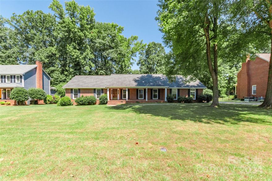 Welcome to this inviting brick ranch home. The charming covered front sitting porch welcomes you from the moment you arrive. Inside, discover a thoughtfully designed floor plan featuring 3 bedrooms and 2 baths, complemented by an additional room with closet, perfect for an office or extra bedroom. The kitchen flows seamlessly into a bright dining area with bay window, ideal for everyday meals. Generously sized bedrooms provide ample space and privacy. Step outside to the covered screened back porch—a peaceful retreat with plenty of room for patio furniture. Complete with a 2-car side entry garage and a practical workshop/storage area in the basement,  accessible from outside, this home offers both space & functionality. Don't miss the opportunity to transform this charming brick ranch into the perfect home tailored to your lifestyle. Selling agent is the owner of this property.