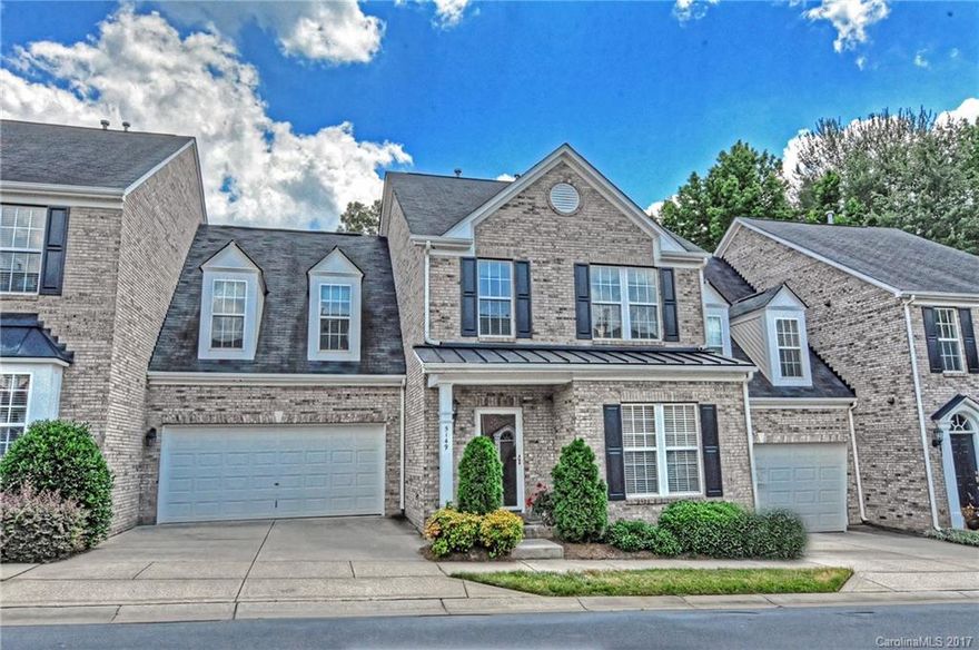 Spacious and Elegant Brick Townhome!  Walk to Shops and Restaurants!  Patio opens to level Grassy Yard bordered by Mature Trees, providing excellent Privacy.  Family Room opens to Charming Sun room & Island Kitchen with an Abundance of 42 inch cabinets. Formal  LR & DR, too!  Grand master suite features Sitting area, 2 Walk-in closets, Tiled bath with Private water closet, Garden tub and Separate Shower.  2 Car garage has Storage Niche.  Upgraded Molding, Fans, Hardwoods, Floored Attic & MORE!