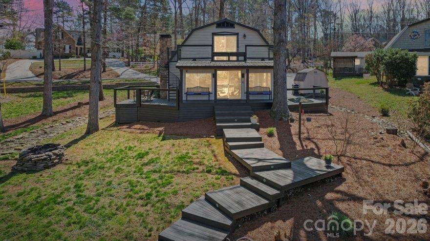 Welcome to your perfect waterfront retreat on Lake Tillery! Tucked away in the back of a peaceful cove, this charming lake home offers the best of both worlds—calm waters for relaxing and breathtaking long-range views of the main channel.
This 3-bedroom, 2-bath home is designed for comfort and lake living. Step inside to find a warm and inviting living space featuring beautiful pine ceilings and a cozy wood-burning fireplace. The kitchen is accented with a stylish tile backsplash, while the bathrooms include a nicely updated tile shower.
Enjoy year-round lake views from the bright and open sunroom, or step outside onto the spacious wrap-around porch—partially covered for shade and perfect for entertaining. The second-floor balcony provides another stunning vantage point overlooking the water.
Outside, the large lot offers plenty of space to spread out, along with an electric boat lift and jet ski lift—making it easy to get out and enjoy the lake at a moment’s notice.
Conveniently located near Piney Point Golf Club, this property combines relaxation, recreation, and scenic beauty all in one.
Whether you’re looking for a full-time residence or a weekend getaway, this Lake Tillery gem is ready for you to start making memories.