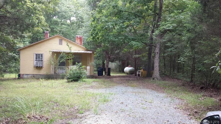 Great property for investors or those looking to build/remodel. Older house with two lots on a quiet, dead end street backing up to Idlewild Road Park in Matthews. Both lots have mature trees and are flat. Home needs work, but can be updated. Harris Teeter shopping center within 5 minutes drive. New roof added in 2010-2011.
