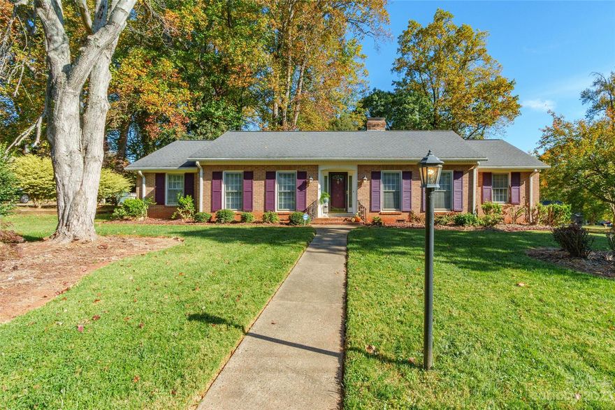 Welcome to this beautifully maintained 3 bedroom, 2 bath, Brick Ranch! The moment you enter, you'll notice wood floors that extend throughout the living space. Both bathrooms are tiled. The great room offers a built in wall unit with shelves and a gas log fireplace creating a cozy space for cooler evenings. Outside you will find a shed and a beautiful fenced backyard. The patio, and sunroom with a ceiling fan provide the perfect spots to relax and unwind. Set on a large corner lot, this inviting home offers both indoor and outdoor living at its finest!