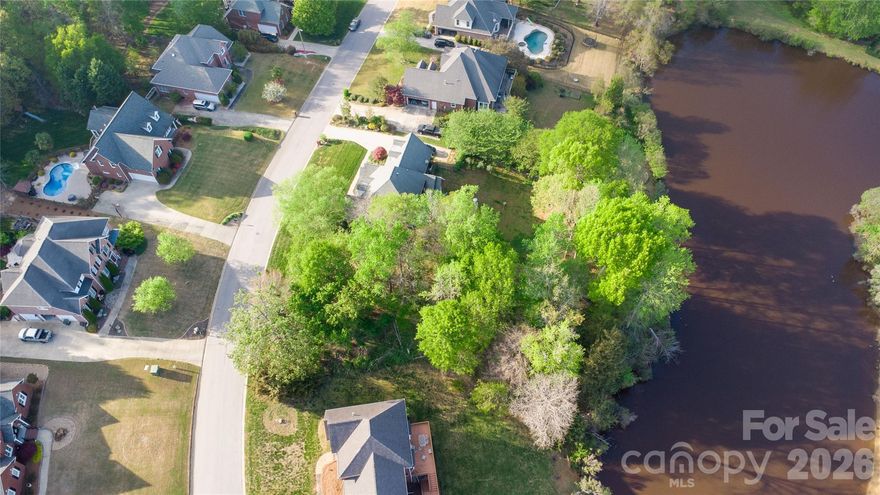 Discover the beauty of waterfront living in Channing Park. This prime lot offers the ideal setting to design and build your dream home with breathtaking water views and a peaceful atmosphere.