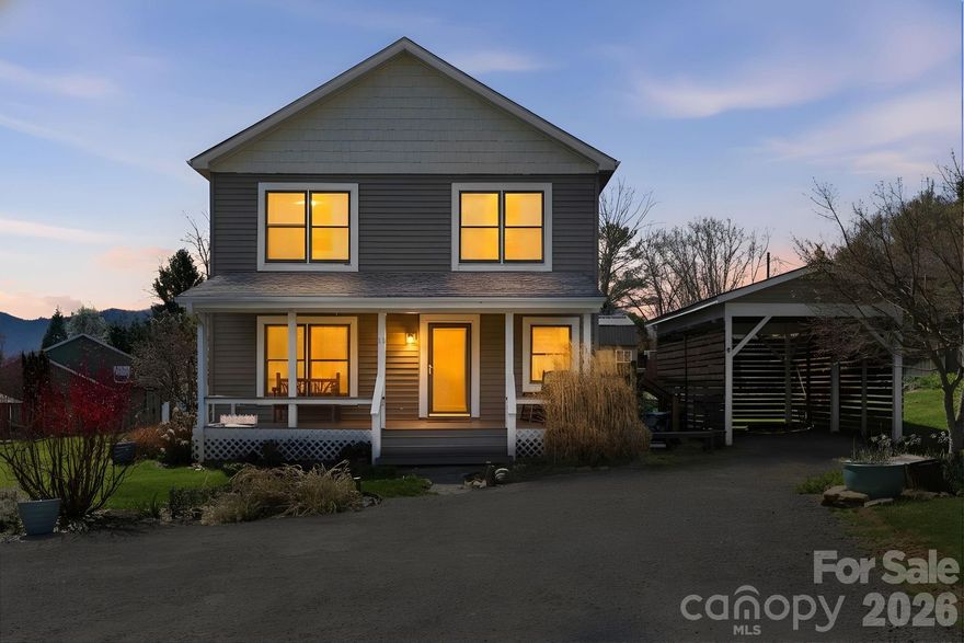 Exceptional mountain retreat on a rare double private lot in the heart of Black Mountain, just steps from the greenway and a short stroll to Montreat. This beautifully 3BR 2.5BA home offers refined living with timeless finishes and abundant natural light throughout.

The main level showcases custom hardwood floors and an inviting living room anchored by a gas stove, creating a warm and sophisticated atmosphere. The gourmet kitchen features granite countertops, stainless steel appliances, and a gas range, seamlessly connecting to an elegant dining area designed for entertaining.

Enjoy indoor outdoor living with multiple spaces to relax and take in the panoramic mountain views, including a covered front porch, expansive deck, and thoughtfully designed grounds.

The primary suite offers a walk in closet and convenient main level laundry. Additional features include dual heating and air systems, gas fireplace, and quality craftsmanship throughout.
The landscaped grounds are a private oasis with a garden area, perfect for gatherings or quiet evenings under the stars.

Ideally located within walking distance to downtown Black Mountain, Lake Tomahawk , and Montreat , this home combines luxury, privacy, and convenience in one of Western North Carolina’s most desirable settings.