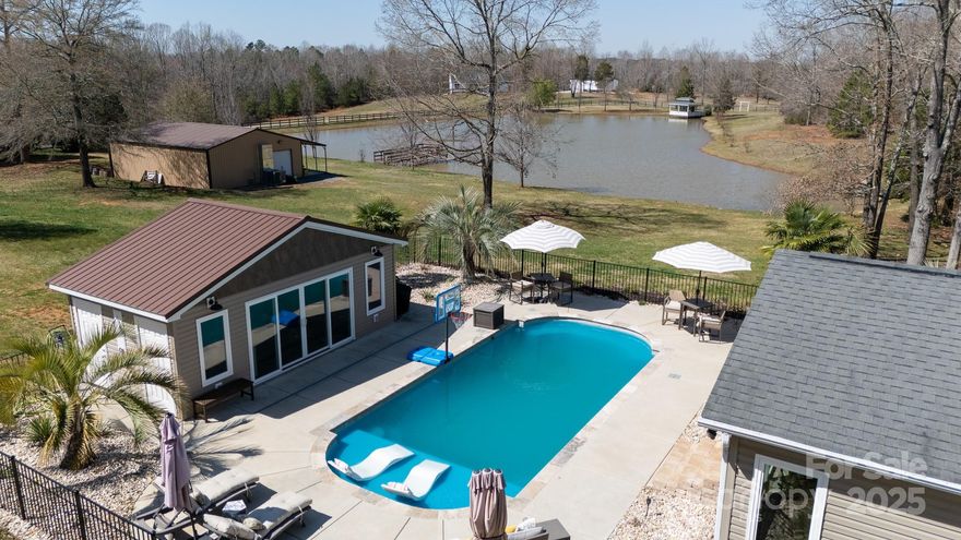 Uncover outstanding investment potential w/ this expansive ranch-style home set on a 25+/-acre estate. With 4BRs & 3BA this property not only ensures comfort but offers significant opportunities for revenue through its fully equipped wedding venue. The venue includes a kitchen, 2 baths, stone fireplace, and a bar—perfect for hosting events that turn into priceless memories. Additionally, 2 large workshops, a parlor room, charming bridal cabin & extensive storage spaces which make it ideal for event planning & execution. 
The estate's picturesque stocked pond invites serene mornings or idle fishing afternoons, enhancing its natural appeal. This estate offers lucrative venture into the event hosting market, all while providing a peaceful lifestyle away from the hustle. Whether capitalizing on event space rental or personal enjoyment, this one promises a blend of profitable investment & tranquil living.