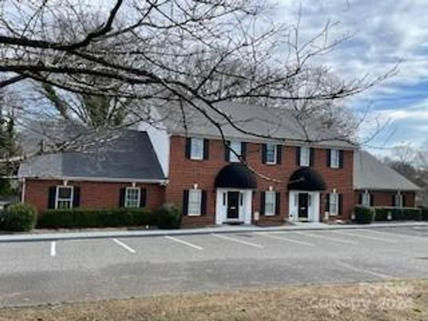 Listing agent is Owner of the building and company.  Carolinas Realty would be interested in leasing back a portion of the building. There are 2 long term tenants also in the building. There are 12 private offices downstairs and 5 upstairs. Conference rooms: 1 small down and 1 large up. Two front entrances, 1 side and 1 rear. Ladies bath, men's bath, and 3 optional  (2 up and 1 down). Large workroom centrally located and large classroom on main level. Reception area. 3 Heat Pumps and gas heat. Security system with cameras and windows protected. Includes all furniture except large leased copier. Internet based phone system available. Hi speed internet and Wifi along with a few computers. Recently painted and remodeled. Very large 2 tier signage.