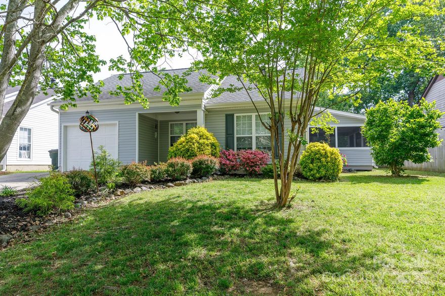 Completely remodeled inside and out, this beautiful home is move-in ready with thoughtful updates throughout. The stunning kitchen features granite countertops, brand new soft-close cabinets, tile backsplash, and stainless steel appliances—including the refrigerator. The spacious primary suite offers a tray ceiling, walk-in closet, and updated en-suite bath. Relax on the welcoming front porch, screened side porch (with included furnishings), or back deck overlooking the fenced yard. The exterior was fully updated in 2023 with new vinyl siding, double-pane windows, storm and screen doors, gutters, lighting, and more. Inside, enjoy all-new flooring, paint, fixtures, bathrooms, and a fully upgraded kitchen. The attached garage has also been finished with insulation, new walls, poly floor tiles, and fresh paint. Washer/dryer, garage fridge, and even a dog door are all included—every detail has been considered. Conveniently located near shopping, dining, and easy access to the interstate.