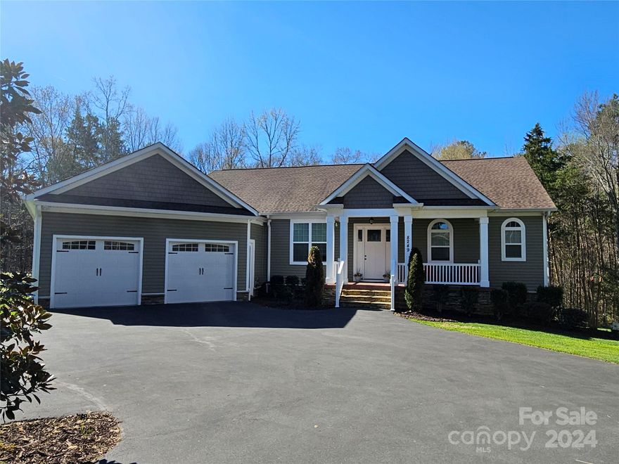 This one owner, quality custom built home sits on a tree buffered, private lot offering seclusion and solitude that won't disappoint.  With the neatly manicured lawn, ornate landscaping and the coverage of vines along the back deck, you'll feel like you're at the park. Inside, with sprawling 10' ceilings, extensive moldings and an open, split floor plan, the home feels massive.  If you still need more space, the 3/4 finished basement lends itself to most any need or want.  A rec room? Check.  An office? Check. A mini kitchen space? Check. Flex space? Check.  Storage room? Check....And the basement opens to the large back patio where you'll find a great area to entertain friends and family too! ***Back active due to contingency contract falling through since buyer's home did not sell***