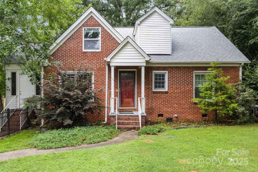 Experience the charm of this 2-story brick home--beautifully crafted in 1930 & full of character! This classic residence blends vintage detail w/ generous space to accommodate today’s lifestyle. The main level features living & dining rooms perfect for gatherings, kitchen with ample cabinet & counter space, 3 bedrooms, 1.5 baths & an a light-filled sunroom. Upstairs, there are 2 additional bedrooms & a full bath, plus a huge finished storage room with easy access. Fresh NEUTRAL paint and large windows throughout! The unfinished basement offers great potential—ideal for storage, a workshop, or your custom renovation. Updates include new roof, new electrical panel, new dishwasher, new upstairs windows, new electric water heater. There is a whole house generator! The refrigerator and washer/dryer convey. Partially fenced yard in the front & along side of house. Basement has separate entrance, outbuilding has electricity. There is a transferrable termite bond with Nelon Cole.