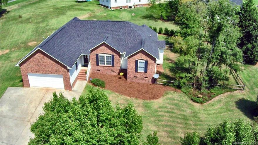 Are you feeling nostalgic and longing for simpler times? This lovely updated Ranch home is move-in ready,  nestled on .50 acre cul-de-sac lot AND walking distance to Clover Community Park where you can enjoy baseball games, tossing horseshoes, disc golf, picnics under covered roof, playgrounds & over 3 miles of walking trails! Brand new S-Steel applncs, newer roof, gorgeous wood & tile flrs! You’ll be proud to call this one “home!”