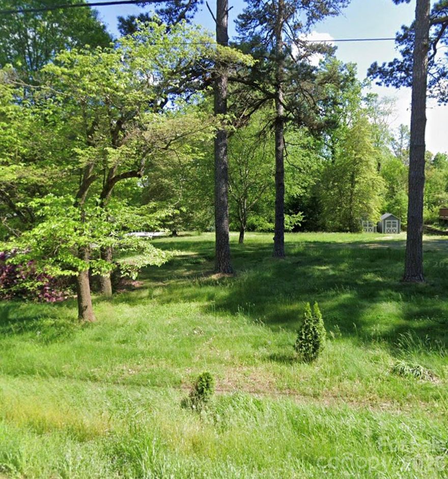 Shovel ready vacant lot in Northwest Charlotte with public water and sewer access. This lot features flat, build-ready topography suitable a slab foundation, ideal for a smooth and efficient build. Two adjoining lots are also available separately, creating potential for a larger development play and added economies of scale. The surrounding area continues to see strong growth, with nearby new construction homes selling for $425k+. The N1-A zoning district allows single family homes, duplex and triplex dwellings. A boundary survey is included, helping reduce upfront due diligence time and cost. Convenient location with strong long-term upside. Excellent opportunity for a builder, investor, or first-time ground-up project.