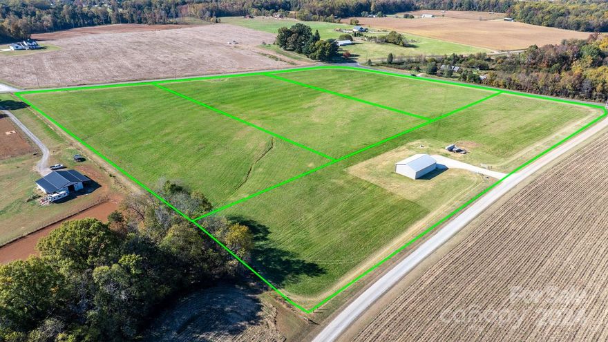 This stunning land is suitable for anyone looking for a peaceful rural atmosphere. Located in picturesque, farm rich western Rowan County, this property is convenient to Mooresville and Lake Norman, Troutman, Statesville, and Salisbury, with easy access to 77, 85 and 40.  Each lot has road frontage and ample space to create a private hobby farm or residential estate. This tract includes a 40x60 nearly new metal shed/barn with a recently drilled well and power already run to the shed. The main frontage is on Hobson Road, but the driveway is located off Hidden View Lane, a private gravel drive that currently serves 3 homes further down the drive. The tax office shows the entire 22 acre parcel as 705 Foster Road, but the address will likely change when it's divided and plat recorded.  No mobiles but modulars are allowed - see details in restrictions uploaded. 1400 sf min. HLA, no further division is allowed of each tract. 4 BR septic permit in place - see attachments in MLS