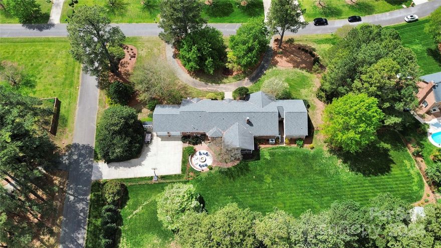 Sprawling brick & hardi ranch on 1.28 acre in sought after Fairlawn in the heart of Rock Hill. This impressive ranch boasts: Formal dining - Office w/ french doors - GR w/ vaulted ceiling w/ built-in's & gas fp - Kitchen w/ island, SS appl, tile flrs, mudroom/butler's pantry, craft rm/additional pantry & breakfast area - Huge bonus/rec room - 
Primary suite w/ vaulted ceiling, sitting rm, 2 WIC's, updated bath & private sitting porch - 2nd primary suite w/ huge WIC & ensuite ba - Spacious secondary bedrooms. Outdoor entertaining is a dream w/ the 20x25 screen porch - Firepit - 18x18 wired shed - Garden shed - Private fenced yard - Circular driveway - Oversized 2 car garage w/ 9ft doors - Large level yard w/ beautiful mature trees & landscaping.
Updates include:Windows, roof, HVAC, electrical, appliances, carpet, whole house water filter, primary suite, garage & rec room.
Easy access to I-77, shopping, entertainment, downtown Rock Hill & Winthrop University. Professional photos 4/17