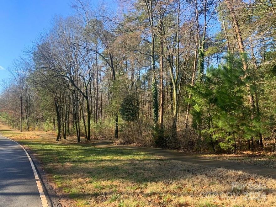Highest and Best Offer by 2/11/24 at 6pm. Welcome to The Sanctuary, a stunning community nestled along Lake Wylie in Charlotte. This wooded homesite spans 4.145 acres, offering the perfect canvas for your custom luxury home to be built by repeat Best of the Lake winners, AR Homes - Monterey Bay Construction Charlotte. As a homeowner in The Sanctuary, you'll enjoy over 22 miles of private trails, a scenic lake view campsite, a 24/7 fitness center, recreational amenities like swimming pools and sports courts, along with access to Lake Wylie for canoeing and kayaking. Conveniently located near dining, shopping, and all Charlotte has to offer, The Sanctuary is only 17 miles from Uptown, 15 miles from Southpark, and 12 miles from Charlotte Airport. Don't miss out on this opportunity to create your dream home in this serene yet connected neighborhood.
