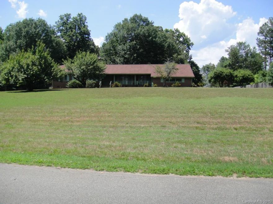 Wow! This full brick ranch is a dream come true. This home has been meticulously maintained and is nestled away on almost 3 acres of privacy. A quick commute to Charlotte with the beauty of a country setting. Don't let this one slip away.