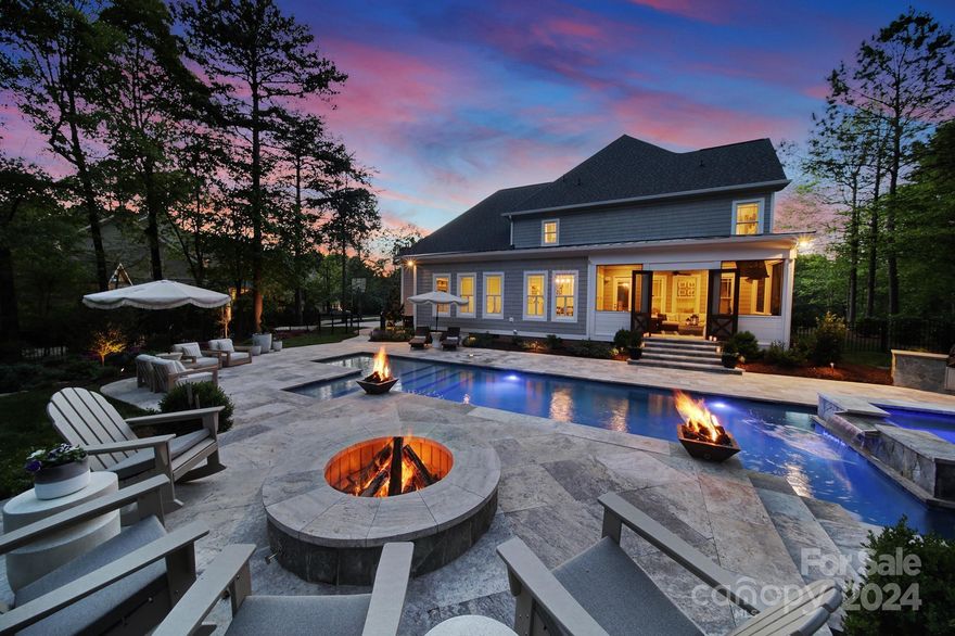 Nestled in the idyllic surroundings of Lake Norman, this exquisite 4-bedroom, 3.5-bathroom home offers a plethora of upgrades and amenities. Situated at the end of a peaceful cul-de-sac, privacy and tranquility await. Step inside to discover a gourmet kitchen adorned with high-end appliances including a Thermador gas range and KitchenAid double ovens. The main level showcases new white oak hardwood flooring, while plush new carpeting graces the upstairs bedrooms for added comfort. Outdoor living is a delight with a screened-in porch equipped with a commercial-grade infrared heater, overlooking the meticulously landscaped backyard oasis. Enjoy the ambiance created by the all-new landscape uplighting as you unwind by the fire pit or take a refreshing dip in the resort-style pool, expertly crafted by Charlotte Pools and Spas. For those who love to entertain, the property boasts an 8-speaker poolside sound system with a 10" subwoofer, setting the perfect atmosphere for gatherings.