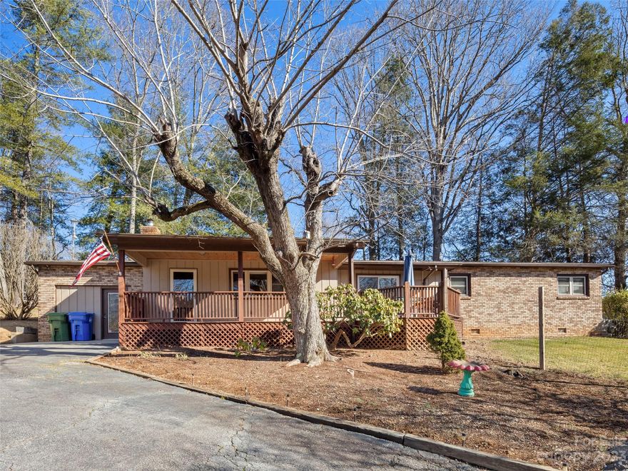 This charming single story home, sitting on almost an acre of land, blends together the allure of a prime location and the luxury of your VERY OWN PRIVATE POOL!   Step inside to discover a spacious living room that features a wood-insert fireplace. The separate dining area with French doors leads to a private terrace. The split bedroom floor plan is both functional and desirable. Two bedrooms and a full bath on one side while the primary suite with private bath and bonus room are located on the other side. The kitchen caters to the cooking enthusiast with stainless steel appliances. Bonuses: an almost new Samsung washer and dryer and a newly installed tankless water heater. Outside is a paradise for gardening enthusiasts, enhanced with new fencing. Countless possibilities within the workshop, complete with electricity. You won't want to miss the chance to see this incredible home!