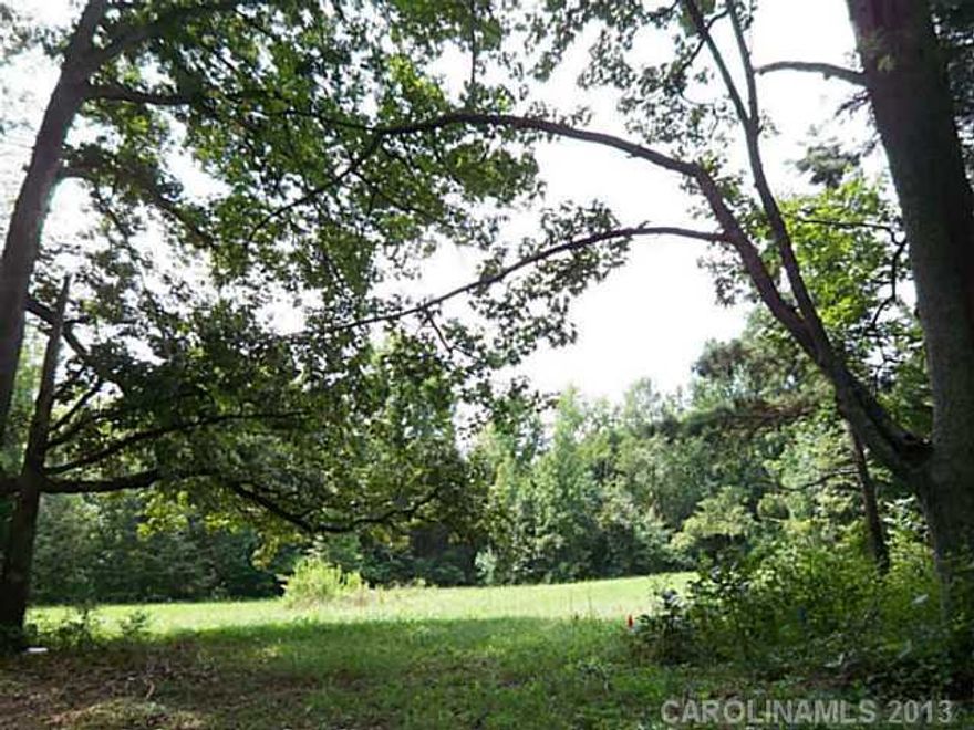 Rare Find!  Beautiful 4.77 acre lot in a gated community that allows horses.  Fantastic location with an easy commute to Charlotte, Concord, Kannapolis, Huntersville, Cornelius, Lake Norman, and Mooresville.  Close to shopping, airports, schools, and recreation of all types.  Suitable for a basement or crawlspace. Plenty of room for a house, pool, and accessory buildings.