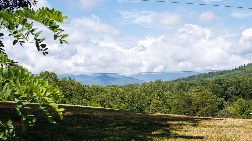 Tiny Mountain Estates offers a blend of modern convenience and Mountain beauty, an ideal community for anyone looking to simplify, downsize, or smart investment. Here, you own your land (no lot-rent uncertainty). Each tract is served by underground power, community water, and a septic system, helping you avoid many of the upfront costs and unknowns that come with raw land. Designed with tiny homes in mind, Tiny Mountain Estates welcomes both stick-built and modular homes under 1,000 sq ft, giving buyers flexibility in design while maintaining a cohesive, value-protective neighborhood feel. Choose an elevated parcel with sweeping year-round ridge views or a wooded setting framed by rhododendron and mature hardwoods. The HOA keeps fees low while protecting property values with sensible covenants that still allow gardens, personal touches, and short-term rentals. Life here is rooted in the outdoors: morning walks along private lanes, spur-of-the-moment kayak runs on the nearby Little Tennessee River, and quick drives to Franklin’s cafés, breweries, and live music venues. Whether you plan to build a full-time retreat, claim a weekend basecamp, in one compelling package.