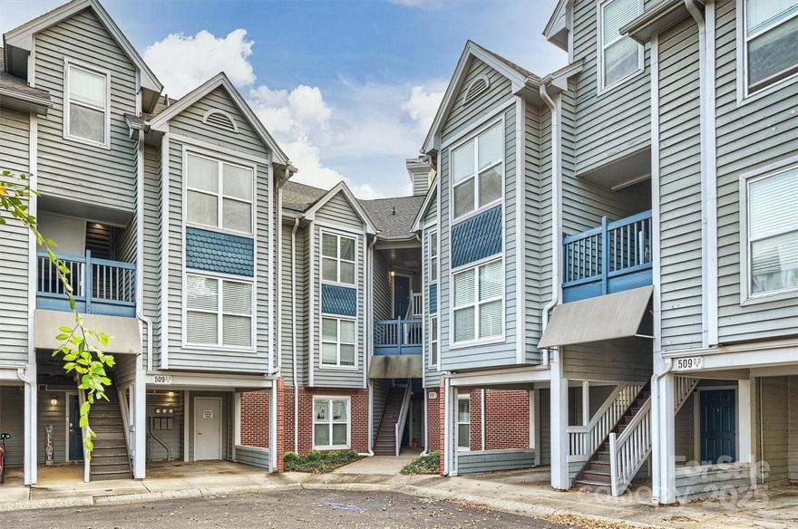 Discover the quiet, top-floor condo you’ve been waiting for in the heart of Charlotte’s historic, tree-lined Fourth Ward! Step inside to bright natural light, tall tray ceilings, and beautiful bay windows. Drop your bags at the drop zone, hang your coat in the spacious hall closet, and get cozy next to the wood-burning fireplace. The open-concept layout flows from the dining area to the kitchen, which features granite countertops and stainless-steel appliances. A convenient half bath in the hallway is perfect for guests and sits next to a large storage closet with a stackable washer/dryer. Both generously sized bedrooms include ceiling fans, walk-in closets, ensuite bathrooms, and a versatile bump-out space ideal for a desk, reading nook, or workout area. HOA dues include water/sewer, trash, exterior and common-area maintenance/insurance, plus access to fantastic amenities: pool, grills, gym, clubhouse (available for private rentals!), and a mini dog park. Roof was replaced in 2024. Google Fiber is available. THIS CONDO COMES WITH 2 PARKING SPACES. Enjoy an assigned covered parking space (#45) with an additional assigned parking spot (#51). All of Charlotte’s best—Panthers’ Bank of America Stadium, Knights’ Truist Field, Frazier, Fourth Ward, and Romare Bearden Parks, plus museums, restaurants, bars, and shopping—are just a short walk away. Easy access to I-277. Come and tour this Fourth Ward gem!