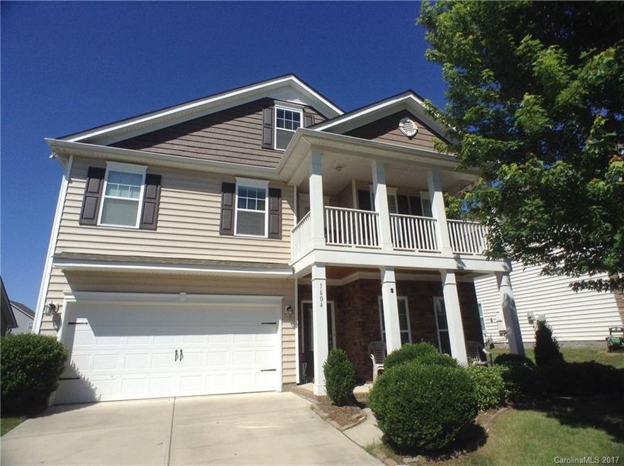 Beautiful 2-story with double front porch and brick accents. Spacious 4-BR, 2.5-bath home has lots of upgrades, incl HWs, crown molding, and gourmet kitchen with SS appliances, granite counters and tile backsplash. Floor plan incl office/living room with French doors, and DR with pass-through into GR with fireplace. Master suite with tray ceiling, sitting area, and bath with garden tub and granite topped dual-sink vanity. Spacious, fenced backyard.
