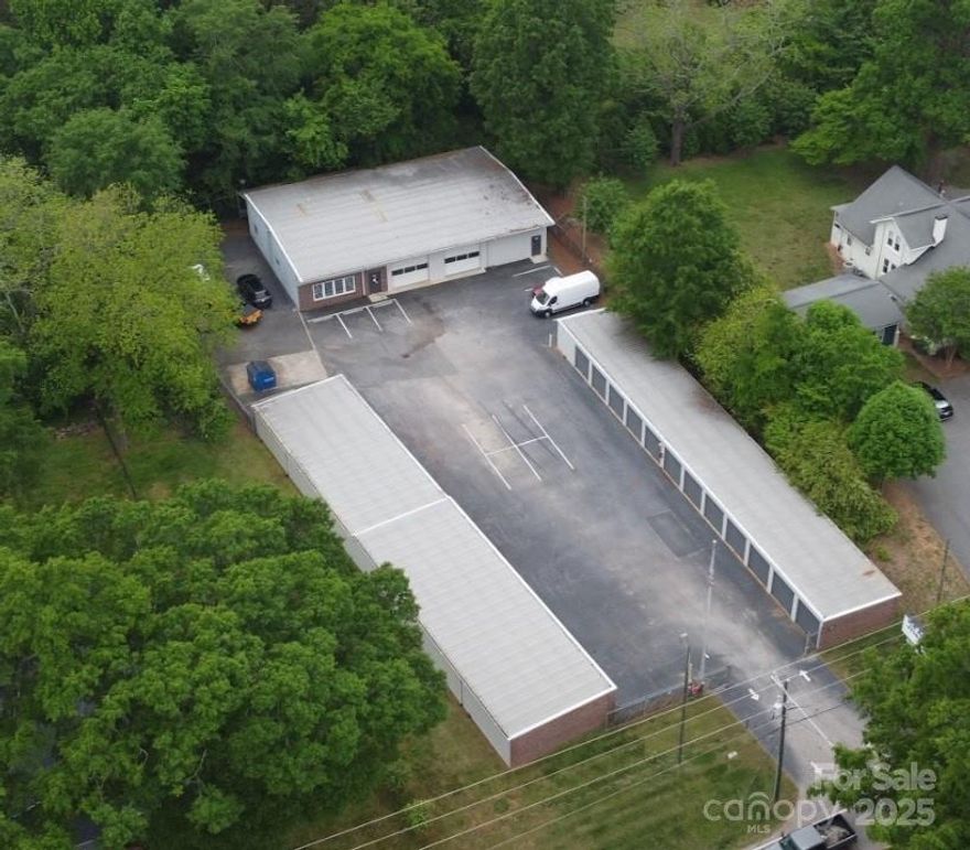 Key Highlights:
28 Existing Storage Units: Onsite mini-storage facility provides immediate passive income. Ideal for investors or owner-operators looking to offset costs.
Dual Units: Separate commercial spaces perfect for office, retail, or service-based businesses.
High-Traffic Visibility: Exceptional road frontage on S Main St with steady vehicular exposure.
Zoning Advantage: General commercial zoning supports a wide range of business types
Convenient Access: Close proximity to I-85, major retailers, and growing residential communities.