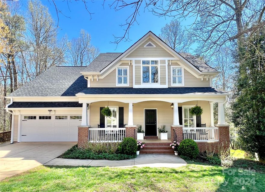 Fall in love w/ this beautiful arts & crafts home that humbly blends comfort & elegance & instantly feel connected in this friendly upscale community. You'll be greeted by your expansive front porch & grand 2 story entryway w/ formal dining to left & versatile rm to make your own on right. Entertain loved ones in your great room, while preparing exquisite meals on your chef’s dream gas range. Overlook your beautifully landscaped flat yard that privately backs up to the trails from your deck or entertain in your fully finished, walk out basement w/ large rec room & end your night around a cozy fire pit. The primary bedroom on main boasts tray ceilings & large walk in closet w/ updated ensuite, upstairs you’ll find 4 addt'l bedrooms. Quick stroll up sidewalk to pool & clubhouse that hosts many social events, playground, pickleball courts, & miles wooded trails w/ creeks running throughout. No wonder Biltmore Park is 1 of the most highly sought after neighborhoods in the county!