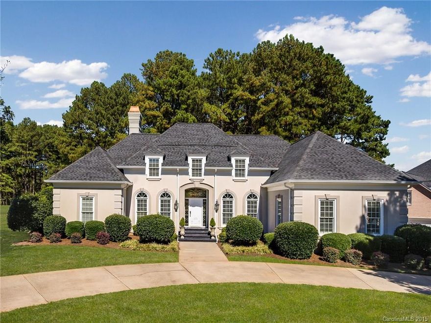 Exceptional curb appeal is just one of the outstanding features this home has to offer. Located near the entrance of The Peninsula on Lake Norman & perfectly sized, this gem w/circular drive and 3 car garage, is nestled on the 14th green. Lush views of the course begin at the front door through the wall of windows flanking the great room. Luxurious master suite opens to large slate terrace. Cook's kitchen w/granite opens to breakfast room & gathering room. Brimming with natural light; charming.