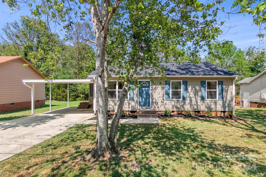 Adorable Updated Ranch Home Ready for you! Enjoy the Beautiful Mature Trees throughout this neighborhood. Short drive to the Updated Downtown Area in Rock Hill!  Walk onto Designer LVP Flooring throughout this home.  Semi-OPEN Floorplan!  Kitchen is AWESOME with White Shaker Cabinets, Granite Counter-tops and NEW SS Appls  All Bedrooms are a decent size with Standard Closets.  Guest bathroom is updated with NEW Toilets and Designer Vanity with Tub/Shower Combo.
Primary Bathroom is UPDATED with NEW Designer Vanity and Incredible Custom Tile Walk-in Shower.  Glass Door is on order and will be installed prior to Closing.   Enjoy your Summer evenings under the Carport.  Additional Storage in the Exterior Storage Room. Come see this one QUICK!!