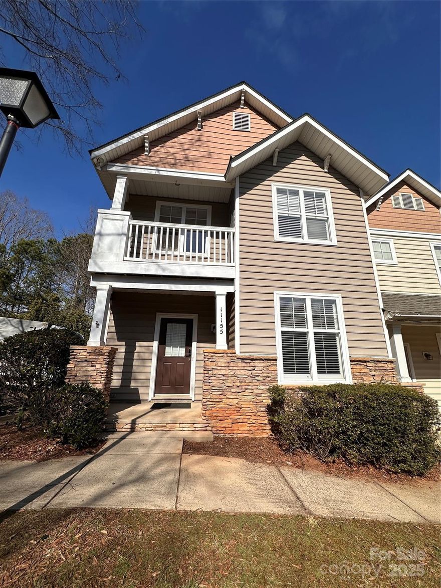 Location, Location , Location. This end unit  townhouse boasts total 3 bedrooms, 2 and half bathrooms and two covered front porch in a desirable Ballantyne area. Back deck facing a nice wooded area with plenty of parking. white Plantation shutter throughout the house. First floor has chocolate colored LVP flooring and white kitchen cabinet. A fireplace separate the living area with Dining room. Breakfast room next to the kitchen with its own window and back door access.  Second floor has master suite with walk-in closet;  one guest bedroom with private access  to the upper covered deck and 3rd guest bedroom as well as a hallway full bathroom. All appliances including washer and dryer are stay in the house. This house won't last long.