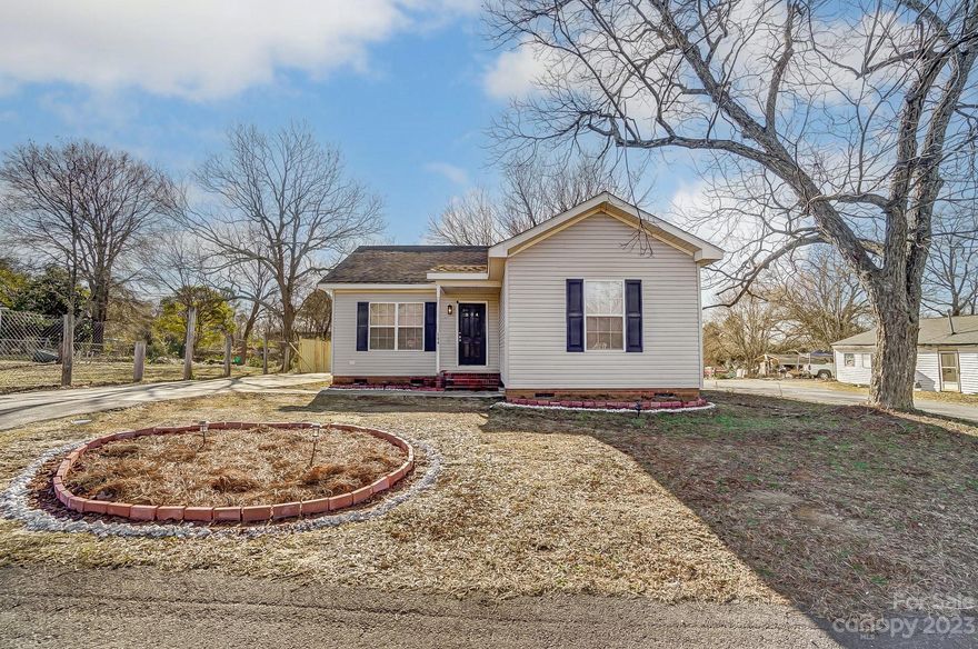 Welcome to this beautiful and charming fully renovated three-bedroom and 2 full bathroom home. Gorgeous kitchen with a huge breakfast bar and updated stainless steel appliances. Large living room with a lot of natural lighting perfect for relaxing or entertaining. Huge primary bedroom and updated bathroom. This home has a spacious layout and features updated Luxury vinyl plank flooring throughout the home, new cabinets, ceramic tiled bath, fenced yard etc.  Enjoy the convenience of a fenced yard which offers privacy and relaxation. With no HOA, this home provides freedom and flexibility. Easy access to shopping, dining, and more, making it an ideal choice for those seeking quiet comfort.