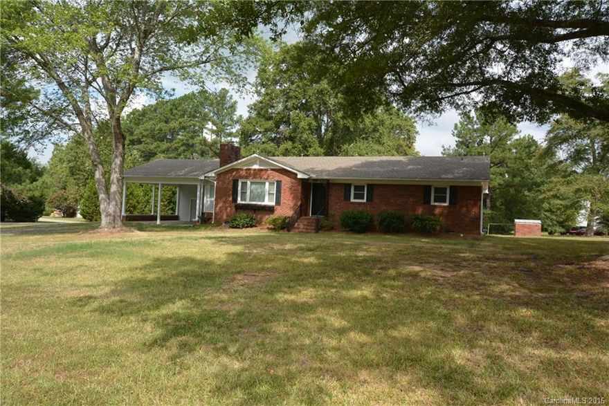 Immaculate brick ranch located on a beautiful 1.1 acre lot.  So much potential!  Freshly refinished hardwood floors in all 3 bedrooms; formal living and dining room.  Den plus another room perfect for playroom, office, mudroom - your choice!  2 car attached carport.  Below appraised value!