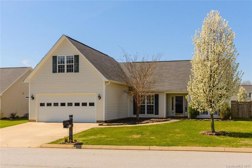 Easy one level living in Livingston Farms with split bedroom floor plan, bonus room and beautiful light filled custom built sun room.  Open floor plan with master on main.  Wood burning fireplace in living room with gas line available for easy conversion.  Community walking trails , play ground and ball field.