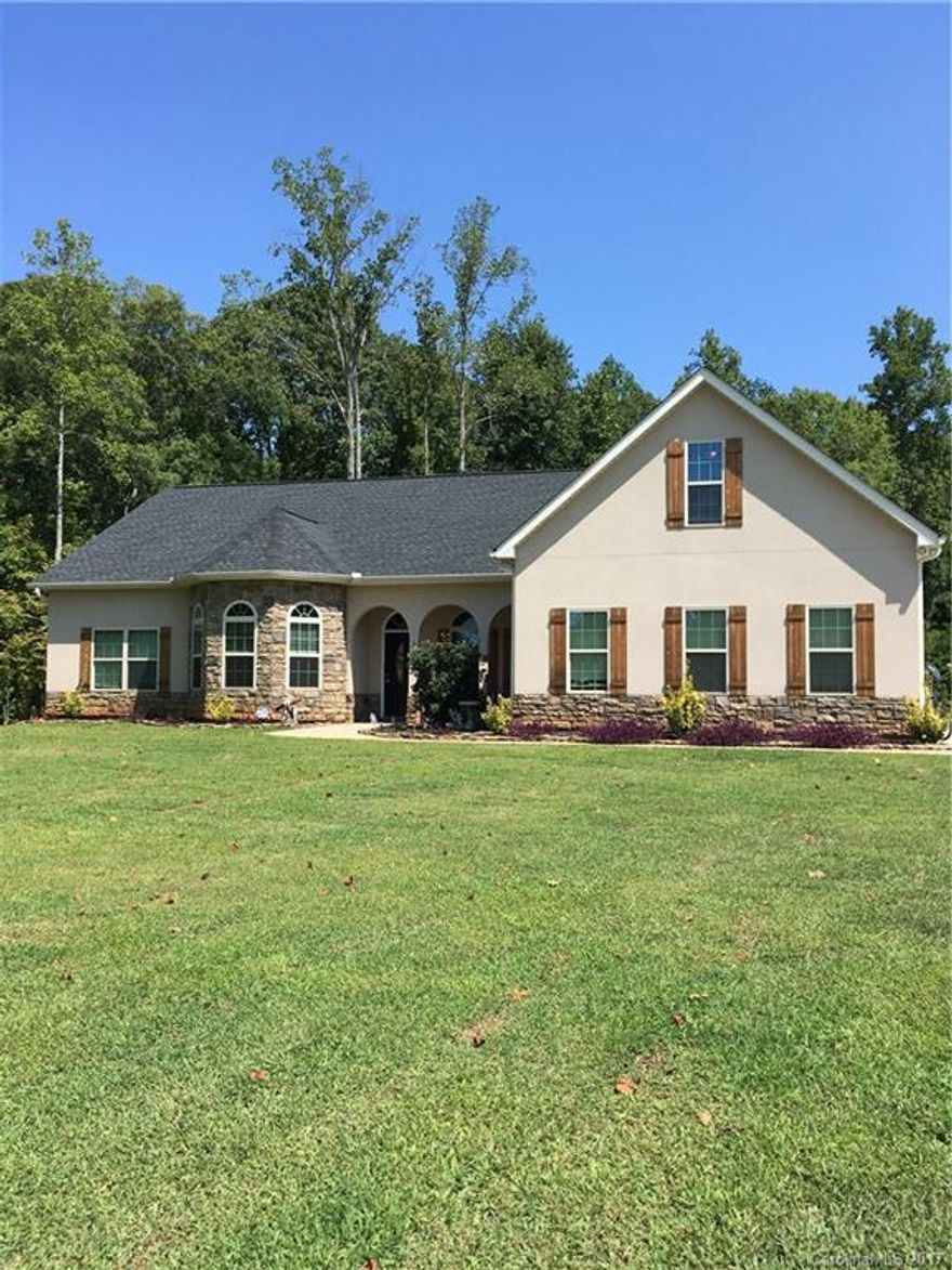 Beautiful 3 bed, 2.5 baths, a large finished room above the 3 car garage on 1.2 acres.  Master bedrm retreat with sitting area.  Master bath with garden tub, separate shower, dual sinks and granite counter tops.  Jack and Jill bath with 2 separate vanities and granite.  Kitchen includes granite counter tops, double oven and overlooks the breakfast nook. Need an office, this home has it!  After a long day, relax out by the pool overlooking the woods. Very quiet and peaceful.  Welcome home!