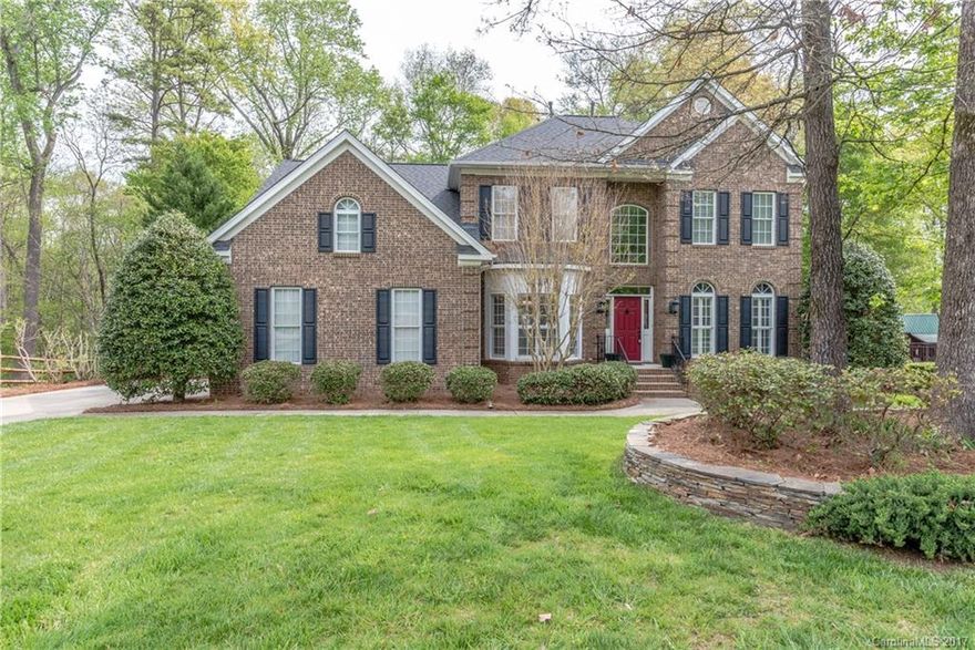Full brick home with in-ground pool in the heart of Weddington. Quiet cul-de-sac location within Weddington schools, fully fenced back yard adjacent to wooded area for privacy. Large kitchen with island and snack bar, open floor plan, first floor bedroom/study with full bath.  Front and back stairs to 4 bedrooms up, w/ huge bonus.  Master suite with trey ceilings, spacious secondary bedrooms.  Large open deck overlooking pool and yard area, perfect for entertaining. Freshly painted and cleaned!