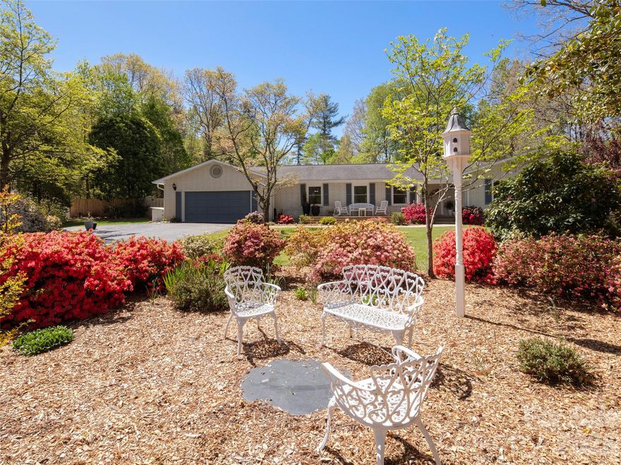 Welcome to Blumenhaus, a beautifully renovated home nestled in a serene Hendersonville neighborhood on a quiet cul-de-sac. This charming property underwent a comprehensive renovation in 2023 both inside and outside, ensuring modern luxury with peace of mind. Step inside this spacious 3-bedroom, 3.5-bathroom home, featuring a dedicated extra room for a home office with exquisite hardwood throughout. The versatile basement boasts its own private entrance and presents a fantastic opportunity for potential short-term rental or an in-law suite, offering flexible living arrangements or potential income. The large family room, complete with a cozy fireplace, is a perfect gathering space.The home is bathed in natural light, enhanced by new double-hung windows to overlook the large flat, fenced-in backyard. The outdoor oasis is equally impressive. Enjoy the tranquility of beautiful, manicured perennial gardens from either the large front deck, the screened in porch or from the backyard patio. This gem offers the perfect blend of updated comfort, and convenience in a desirable location.
