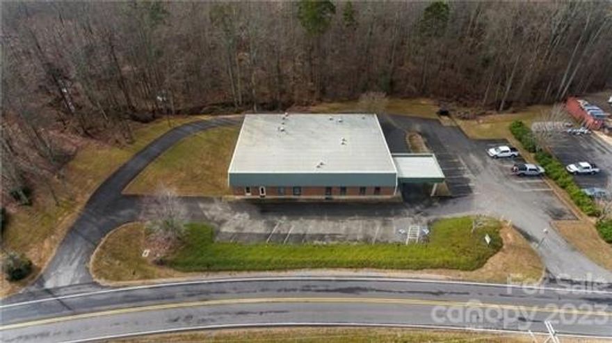 One mile to I-85 S. Less than a half a mile to Highway 74 Business. Building has one loading dock. Paved Parking is included.
