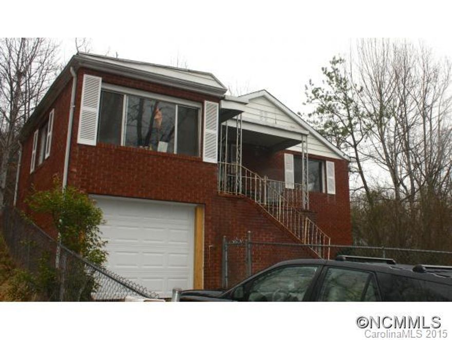 Brick 4 bedroom in Black mountain "Priced to Sell." Needs TLC but lots of potential. Wood floors, stone fireplace w/insert, 1 car garage, fenced yard. Sold "As Is". Currently rented on a month-to-month  showings Wed thru Sunday after 4:00pm. Monday and Tue evenings OK. 24 hour notice required.