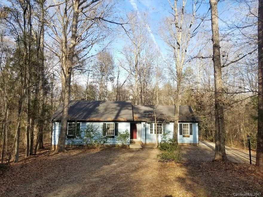 Very Hard to Find Ranch Home on 2 acres.  Lots of privacy surrounding this home.  3 bedrooms, 2 full baths.  This home has 3 large bedrooms and a great walk-in closet in the master bedroom.  Large fireplace in the living room. PRICED TO SELL & MOVE QUICKLY.  Home needs some cosmetic updates and is priced accordingly.  Great investment opportunity.  Open floor-plan.   Great location, minutes from the Ballantyne Area & Great Schools. Septic tank inspected December 2017 and has received a clean report.  Home being sold AS-IS, no known issues.