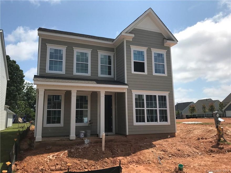 Our popular Victoria plan features open floor plan, hardwoods on main, fireplace and gourmet kitchen.  Spacious eat-in kitchen with walkout to rear covered and screened-in patio.  Main floor also has guest suite and study.  The upper level features spacious loft area and third floor has a game room with a full bath. Detached garage has generous attic storage in upper level.