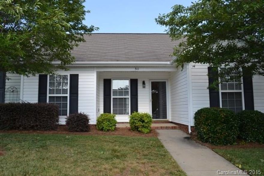 What a dollhouse!  This townhome has all new floor covering, freshly painted!  Split bedroom plan with large great room, spacious kitchen and eating area.  Master bedroom has a large walk-in closet.  Floored attic space, front porch and a fenced private patio.