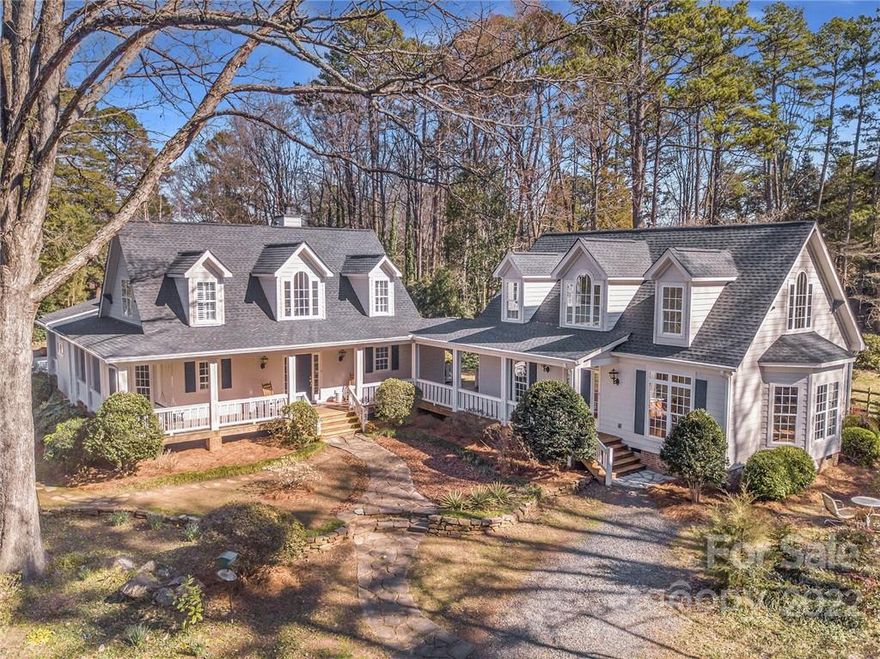 This home is a RARE FIND-amazing from all perspectives. 501 Shasta Lane is set on 1.52 Acres--the Main House has a dining Room, fabulous updated kitchen (with a walk in pantry) open to the breakfast room & the great room with a REAL stone fireplace & built-ins, Primary Bedroom on the main w/ en suite Bath. The upstairs has two bedrooms, a full bath & a huge bonus/game room. Off the Kitchen/Great Room combo there is access to an incredible Screened Porch as well as a Covered Porch, Deck Area & a Climate Controlled 3 car Garage (with 200V Panel). The Rocking Chair Front Porch joins the Guest House to the Main House. Your guests have their own space with a 2 story Great Room, Kitchen, Main Level Bedroom w/Full Bath & an additional Bedroom/Bonus Room & Full Bath Upstairs. The grounds are so peaceful and calming--you have to see it to believe it-there is a large garden area, 2 sheds, a tree house and more. Located in Cotswold--your own private oasis! I want to show you around!